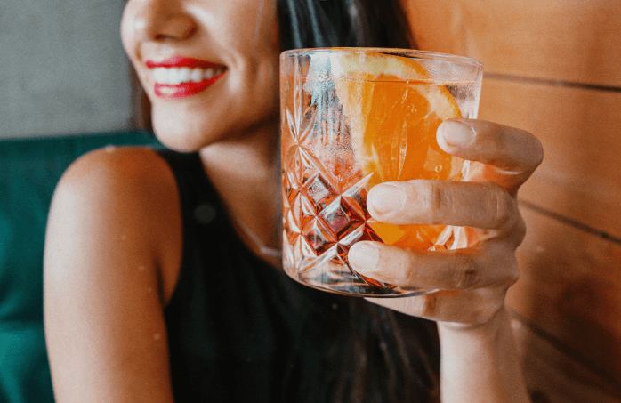 Lady holding Negroni